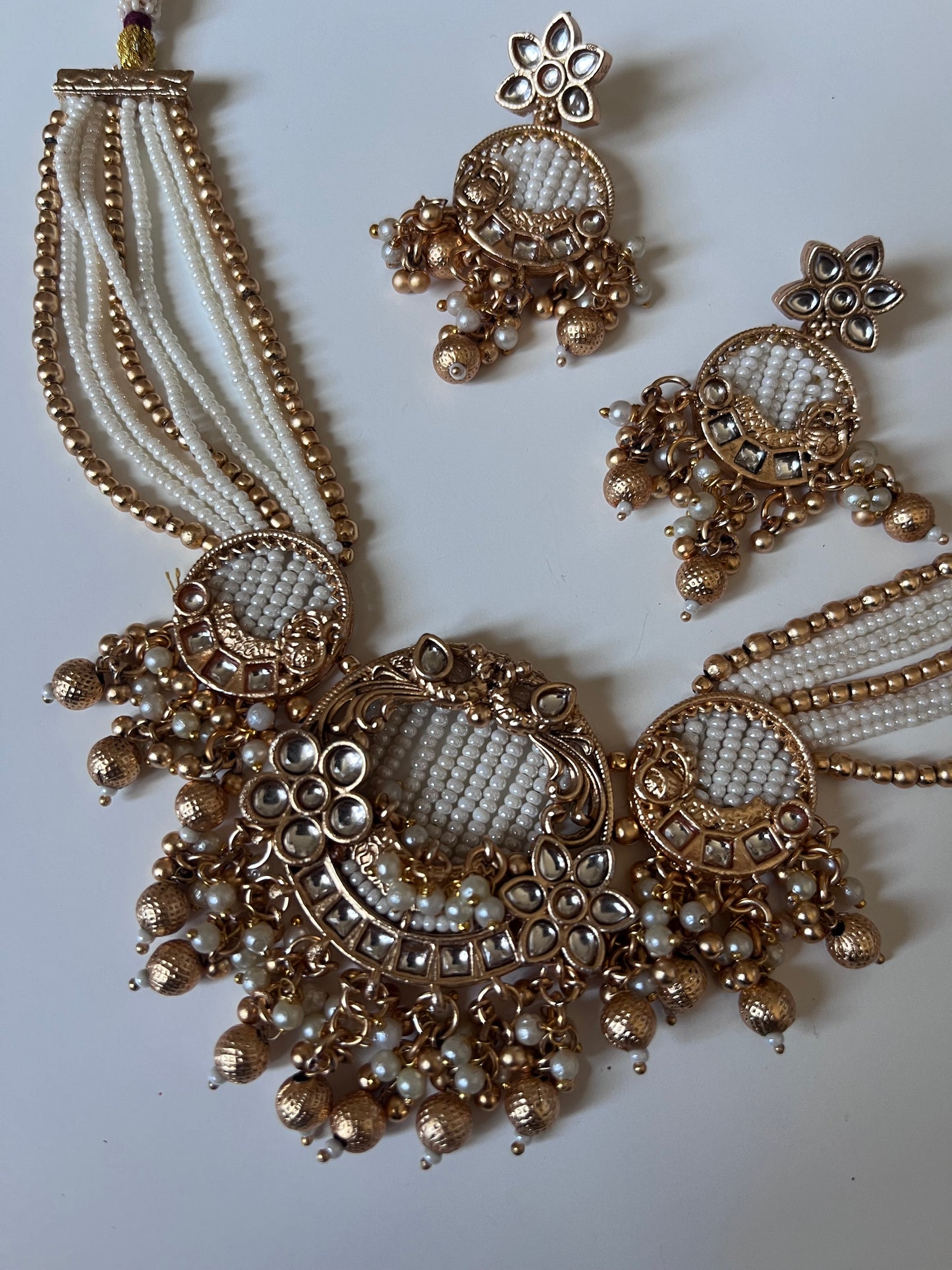 Antique gold pearl bells set