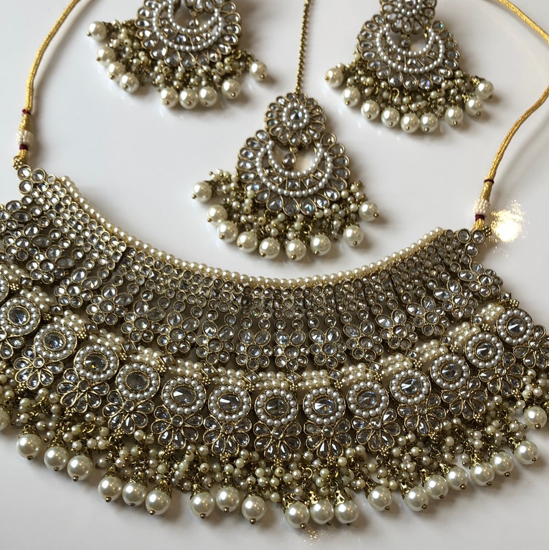 Gold Extravagant Bridal Necklace Earring Tikka Set