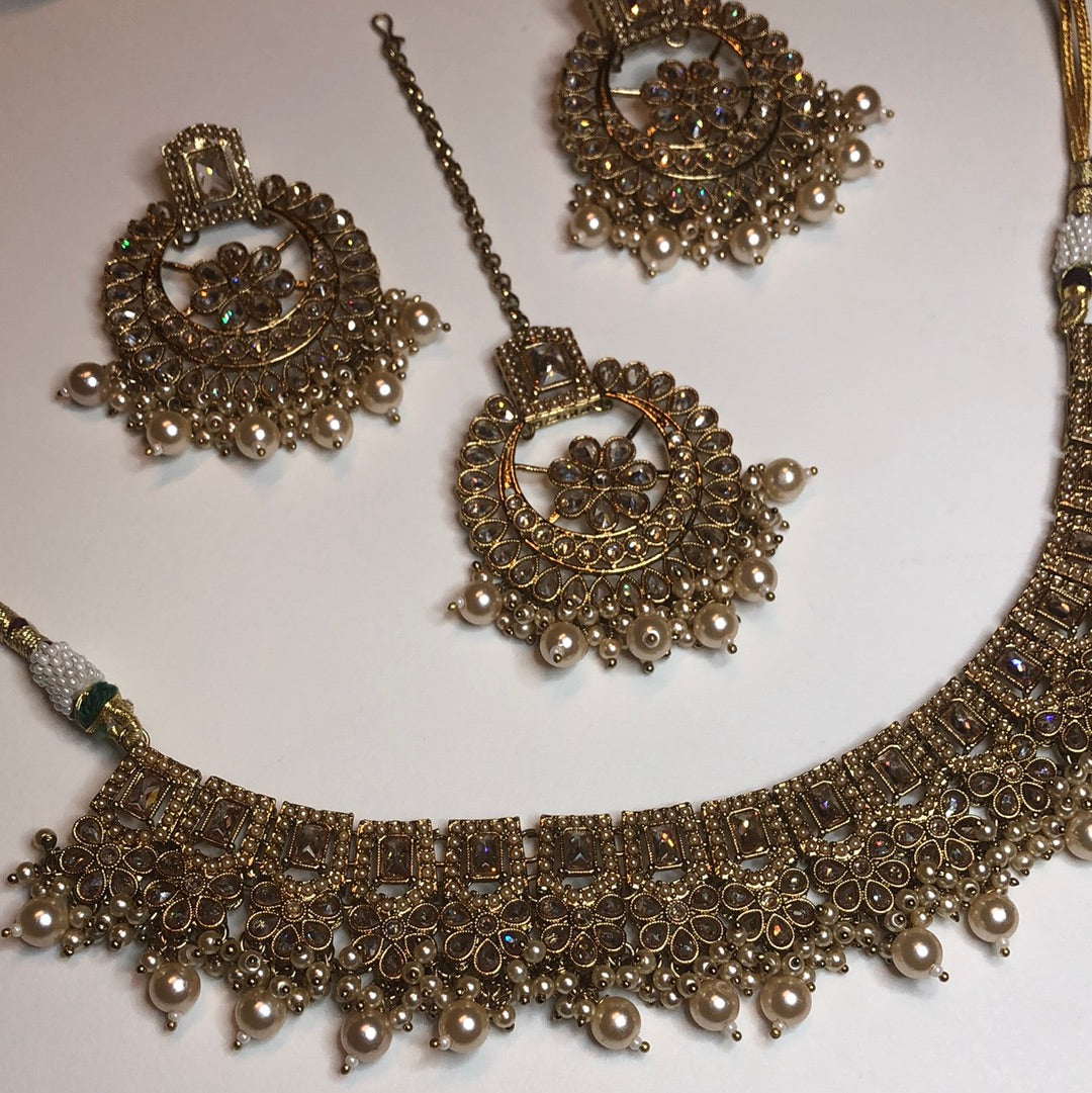 Polki Circle Necklace Earring Tikka Set