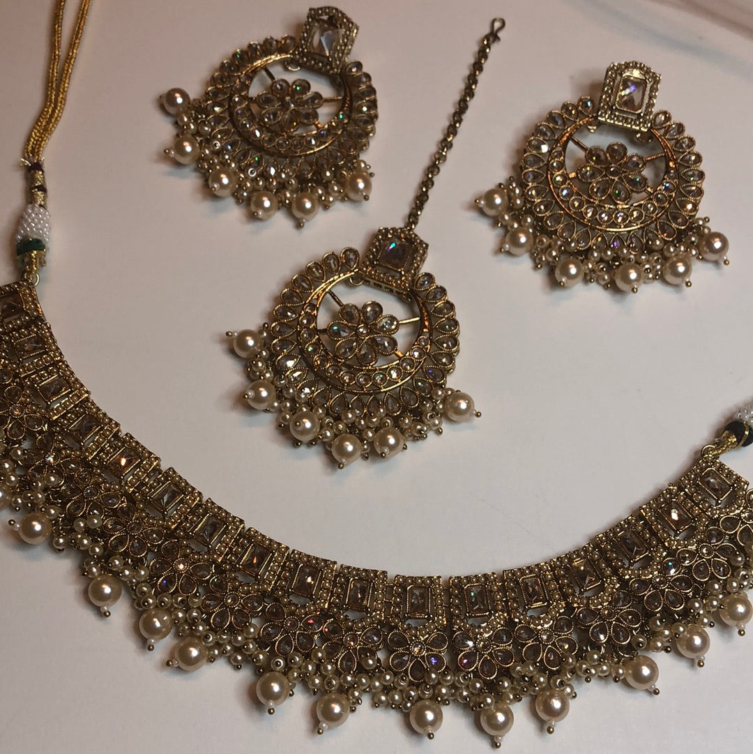 Polki Circle Necklace Earring Tikka Set