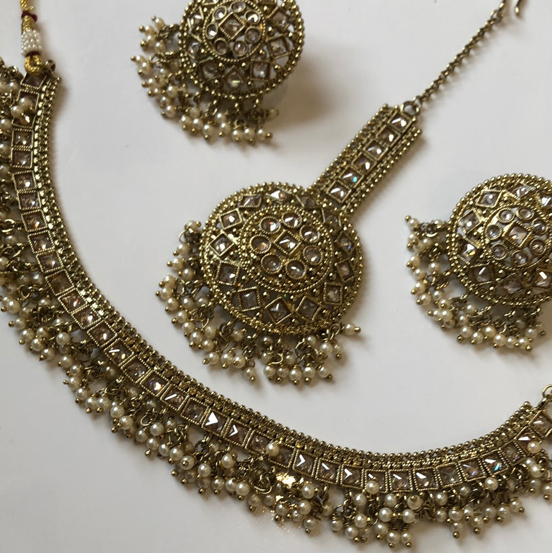 Gold Circle Necklace Earring Tikka Set