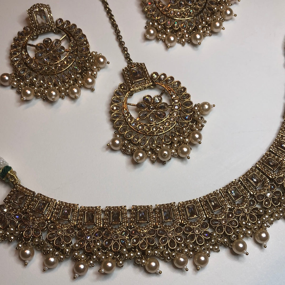 Polki Circle Necklace Earring Tikka Set
