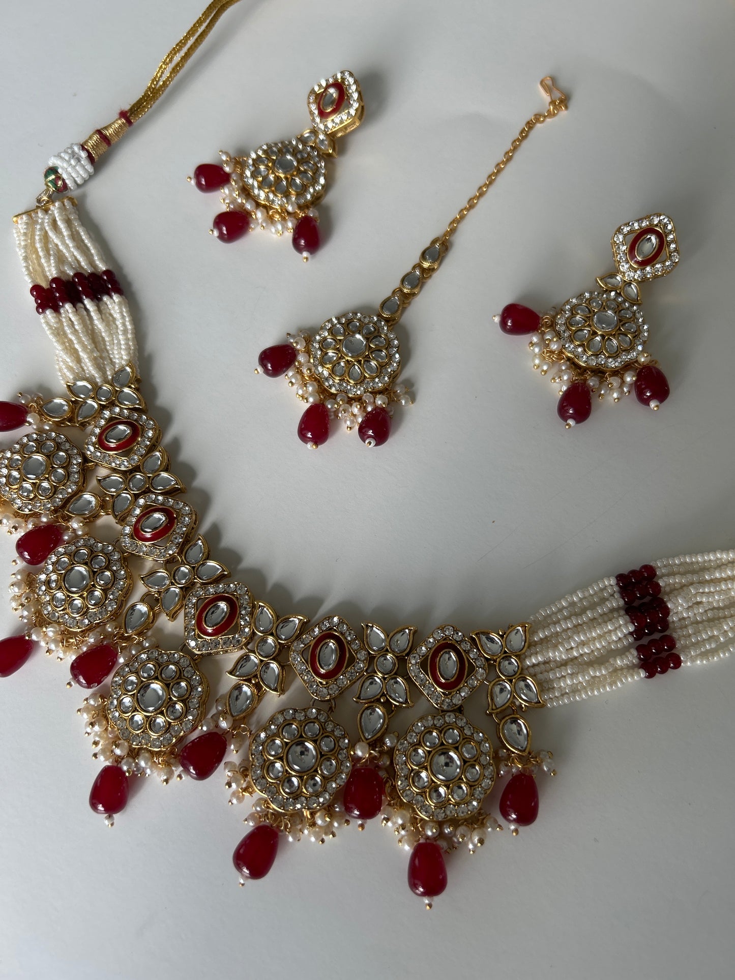 Red necklace earrings tikka set