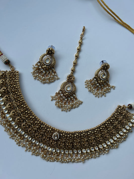 Elegant Faux Gold White Necklace Earrings Tikka Set