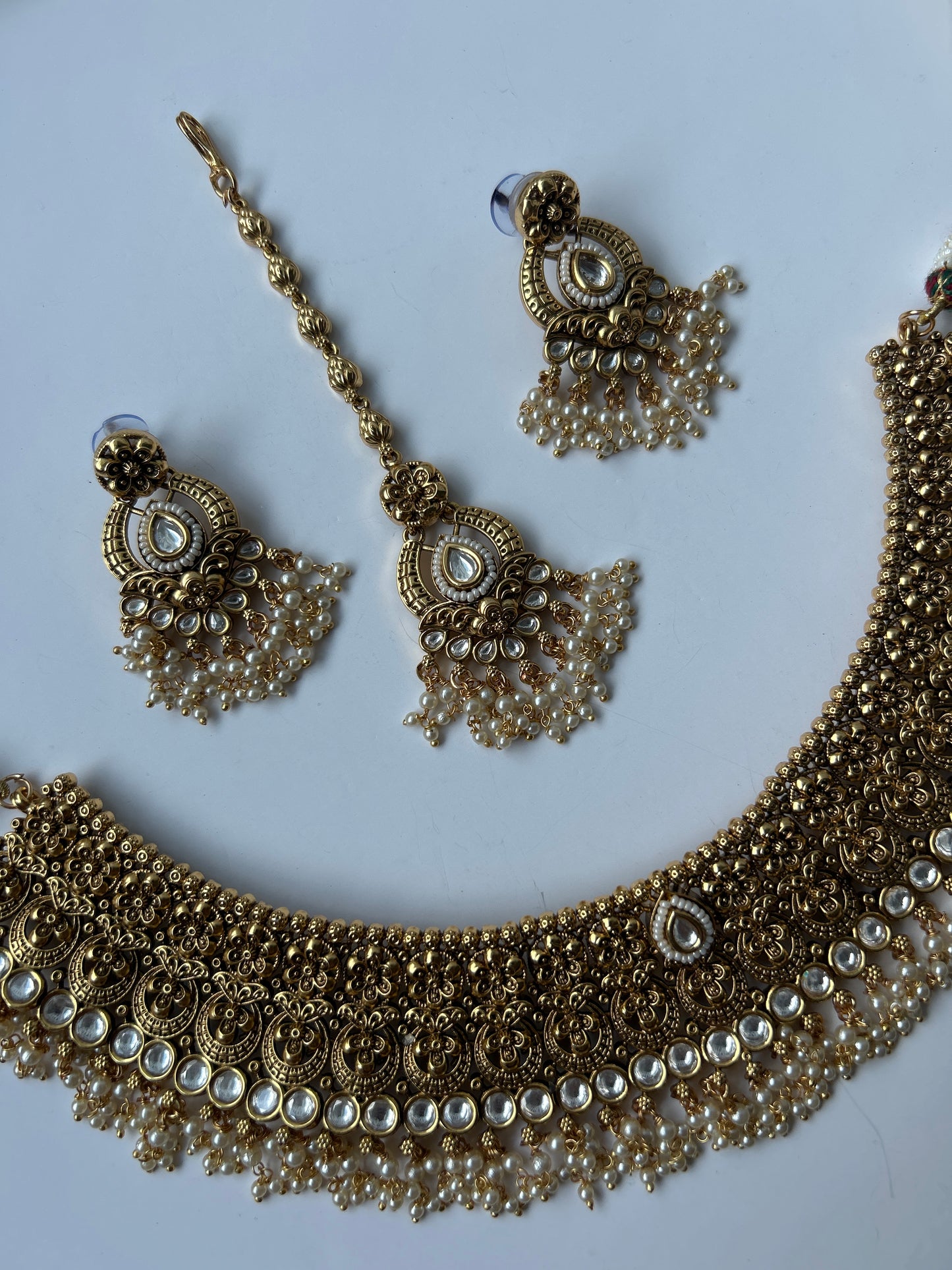 Elegant Faux Gold White Necklace Earrings Tikka Set