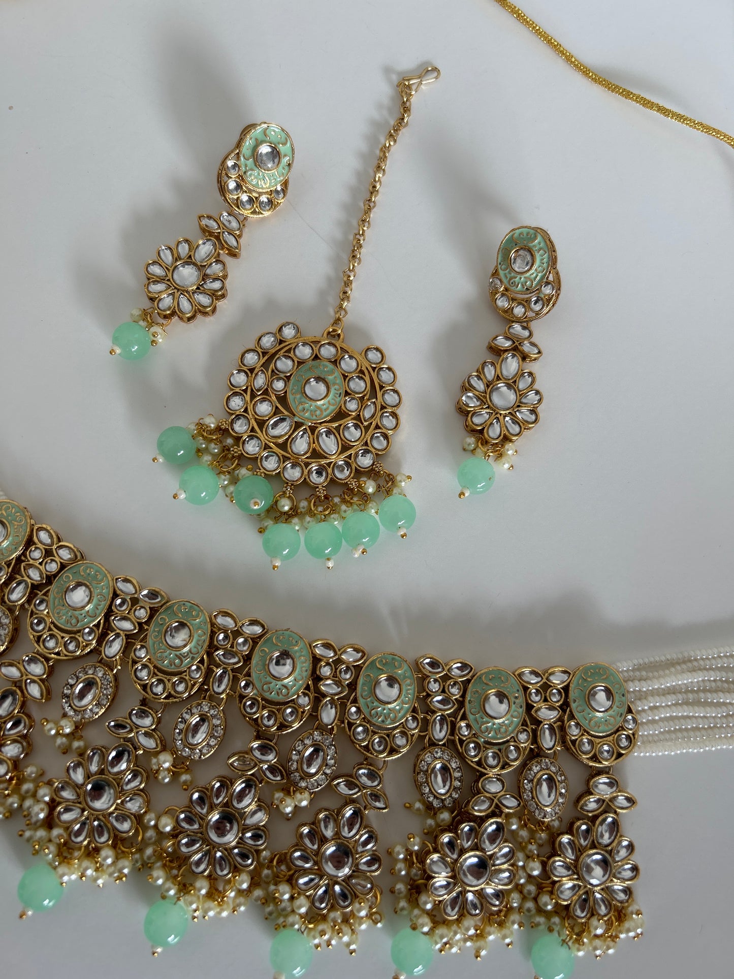 Green crystal necklace earrings tikka set