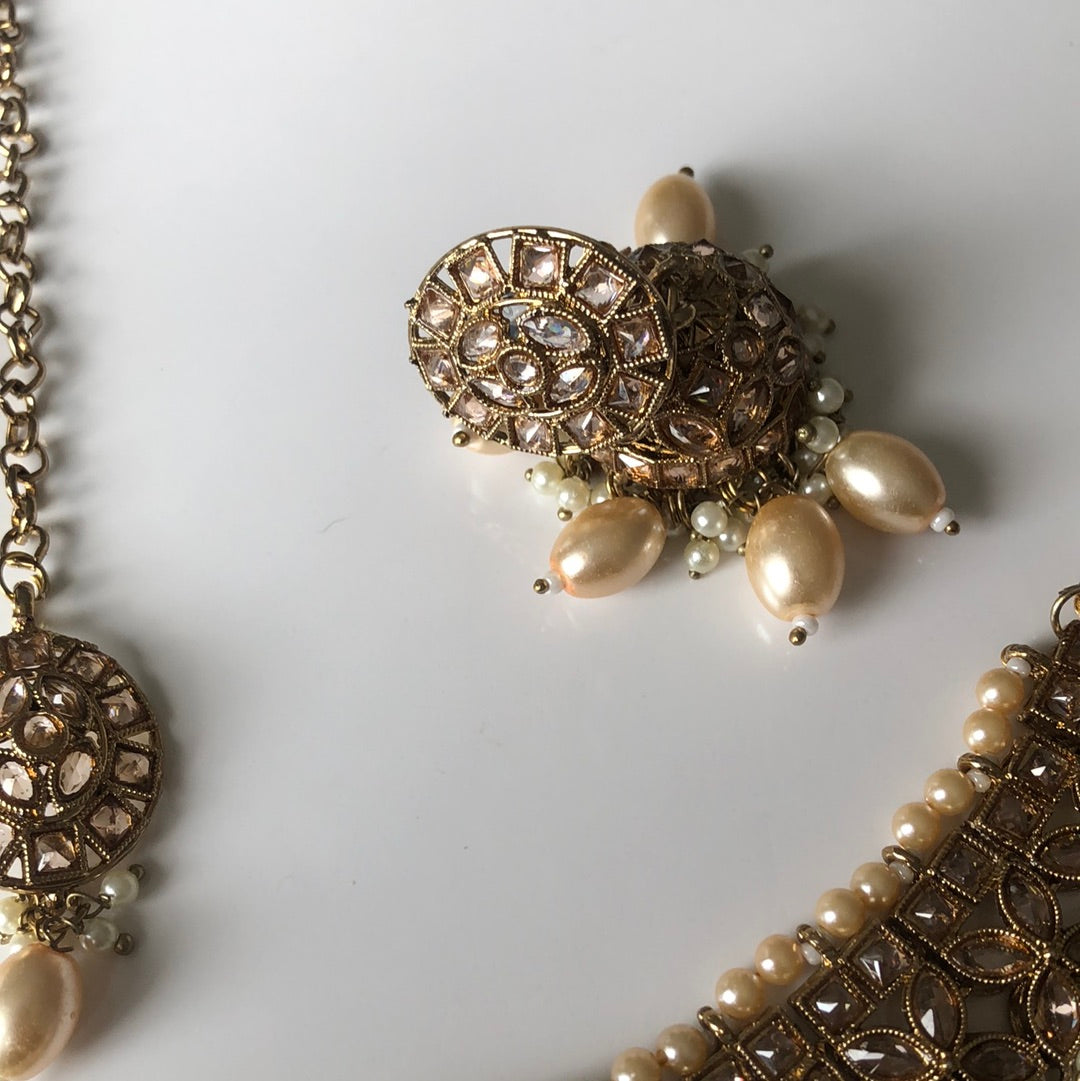 Floral Gold Oval Pearl Necklace Earring Tikka Set