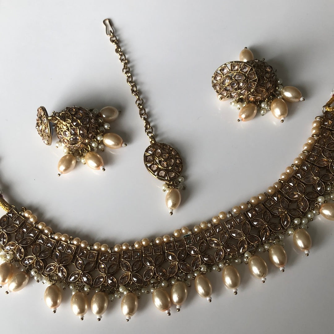 Floral Gold Oval Pearl Necklace Earring Tikka Set