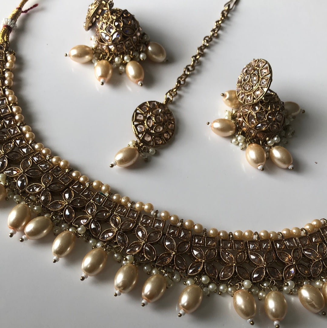 Floral Gold Oval Pearl Necklace Earring Tikka Set