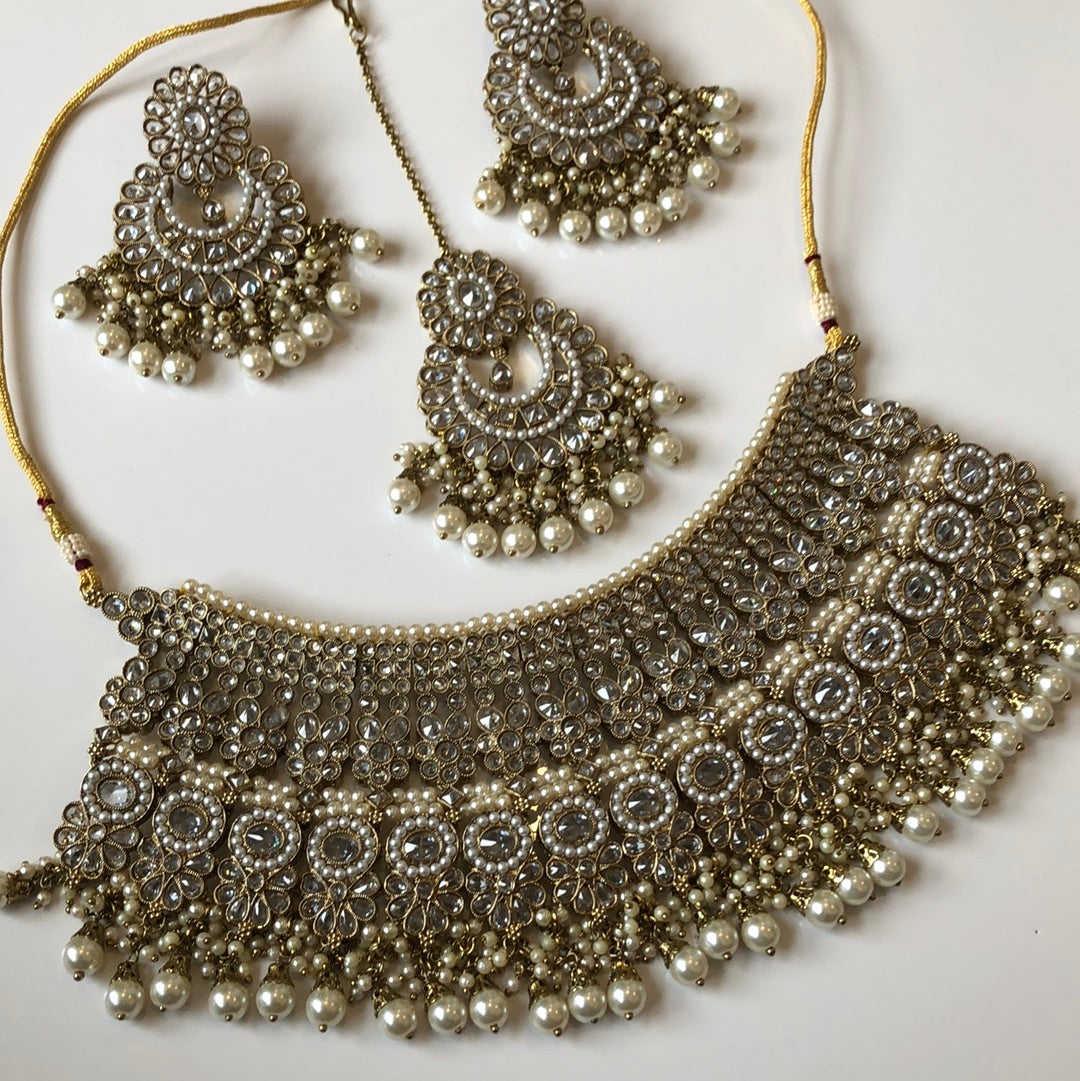 Gold Extravagant Bridal Necklace Earring Tikka Set