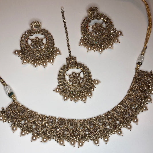 Polki Circle Necklace Earring Tikka Set