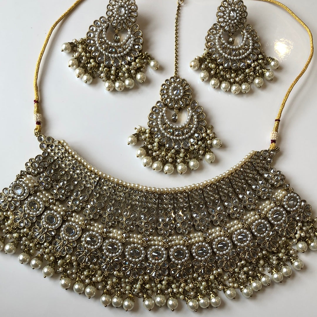 Gold Extravagant Bridal Necklace Earring Tikka Set